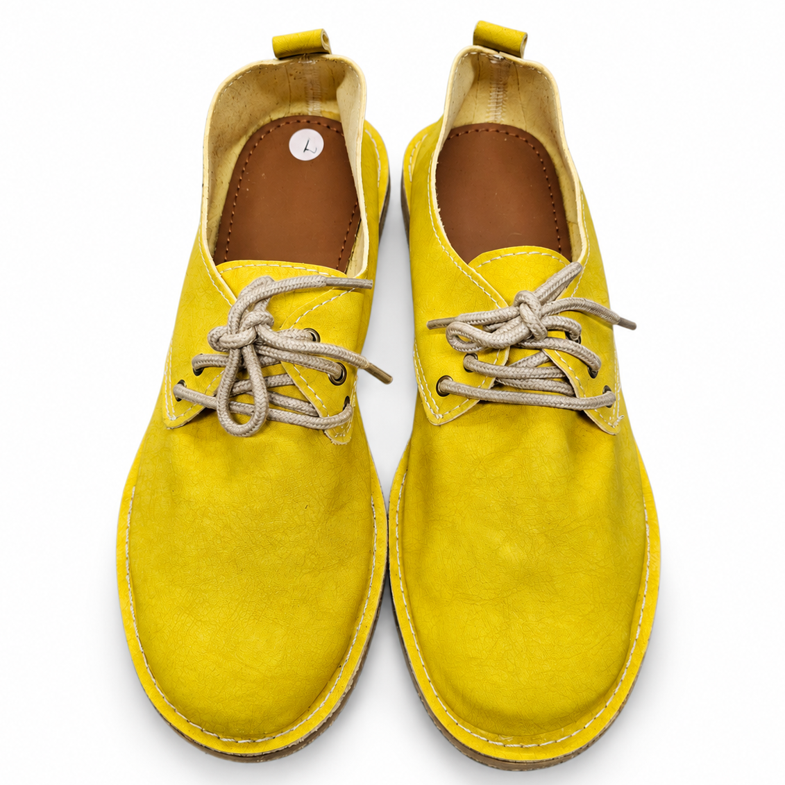 A pair of bright yellow Lace Up Veldskoen | Vellies