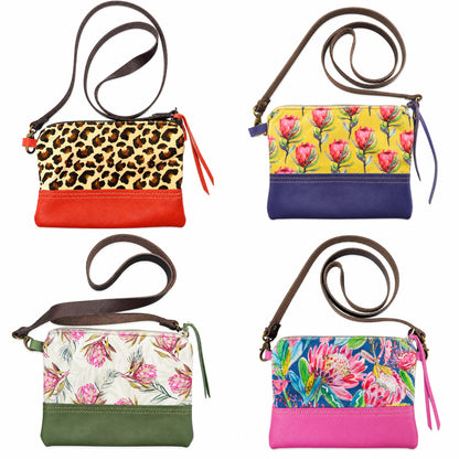 Genuine Leather Trim Africa Sling Bags